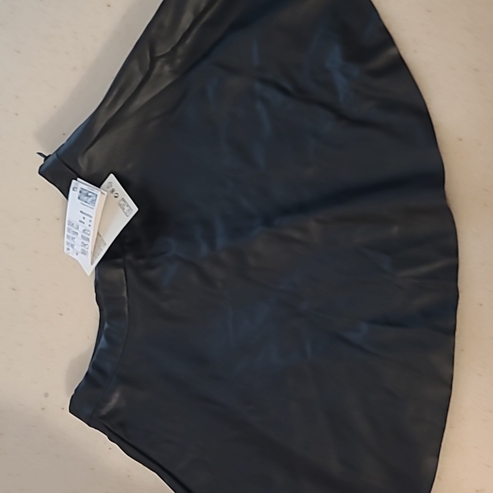 Faux leather skirt (wrinkles are from being folded)